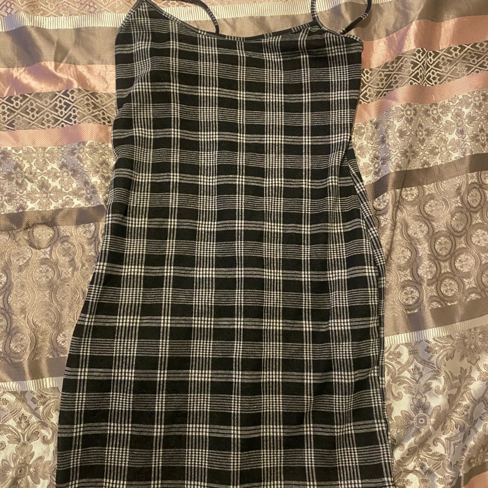 A plaid overall dress.